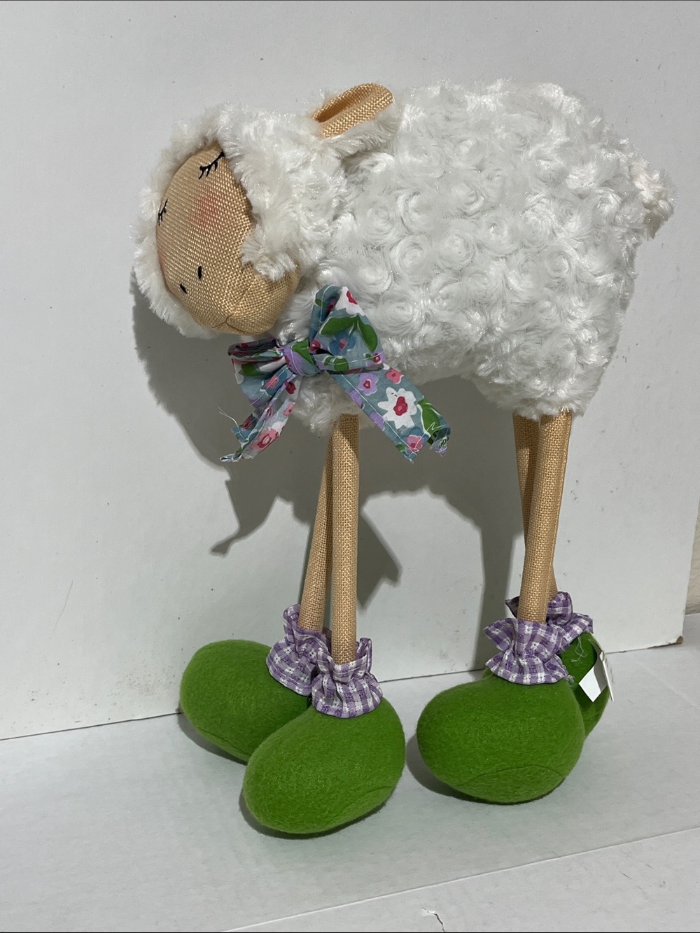 Whimsical White Lamb Figurine with Green Feet and Floral Bow